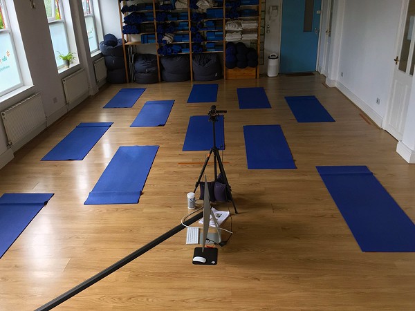 The Yoga Rooms Studio with yoga mats and online broadcast equipment